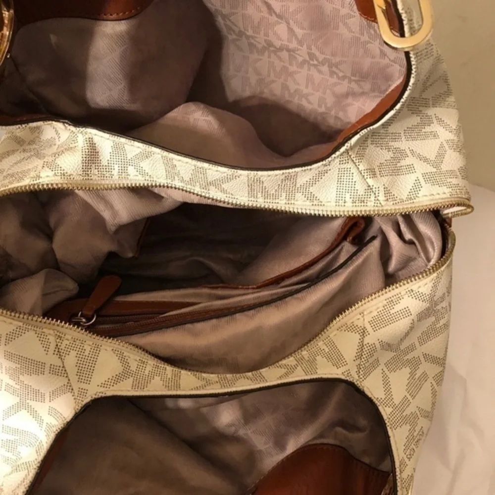 Michael kors white monogram triple compartment bag